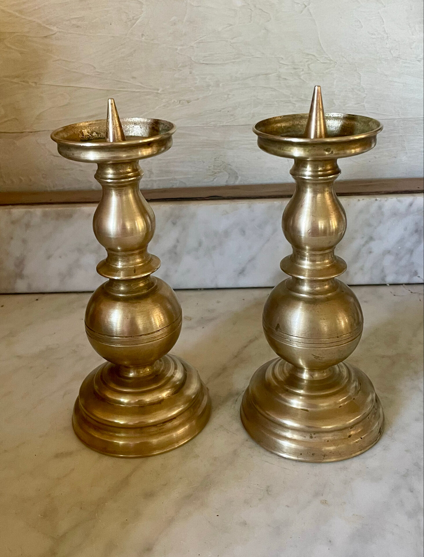 Pair of solid brass candlesticks from the 19th century.