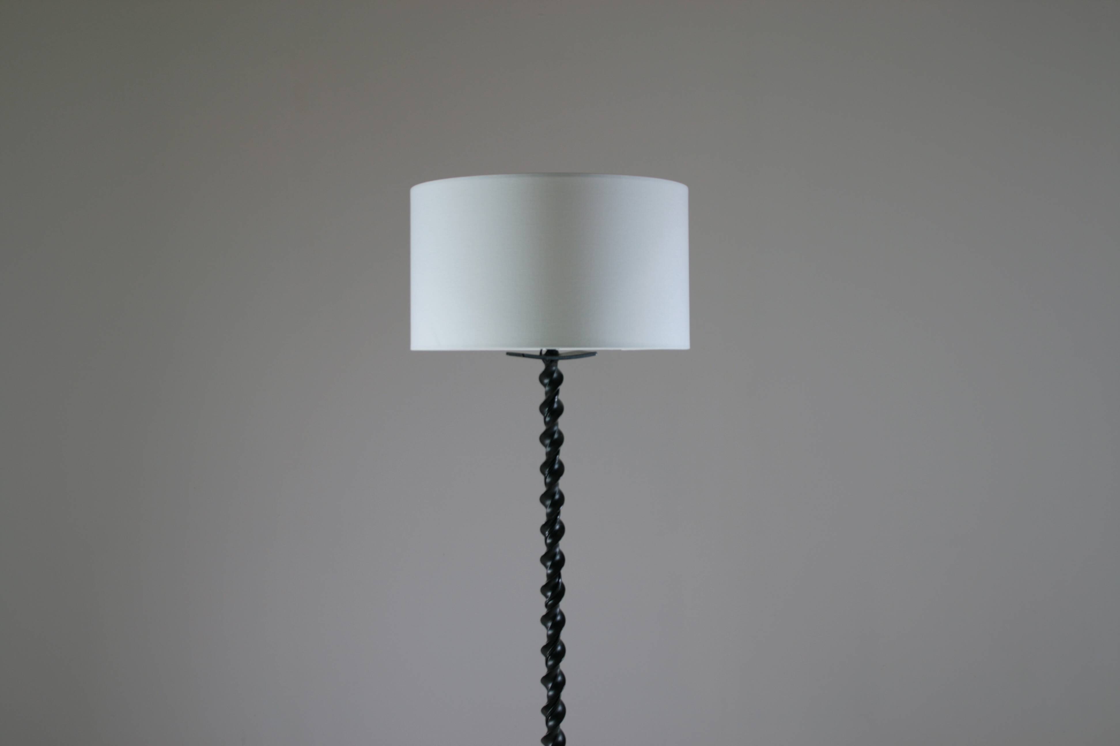 Twisted black metal brutalist floor lamp