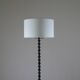 Twisted black metal brutalist floor lamp