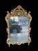 Grand miroir XVIIIe en bois doré et laqué vert