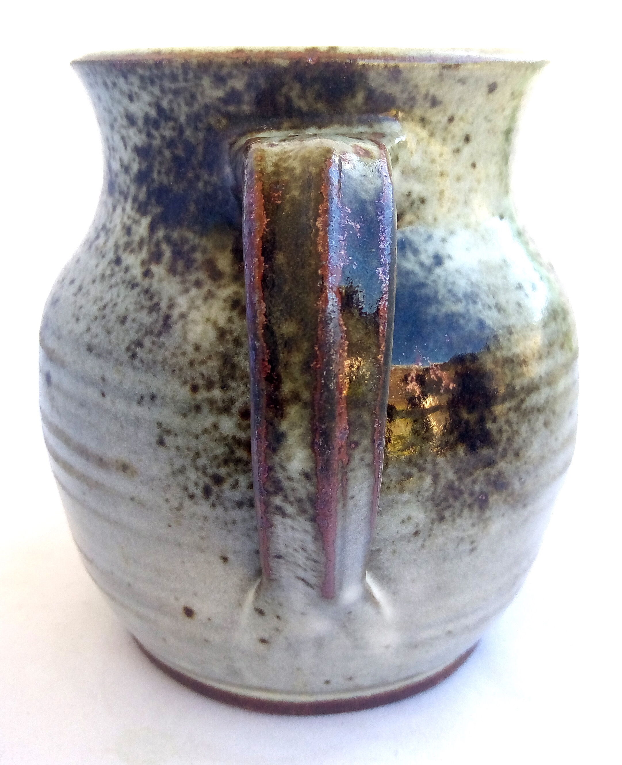 Sarthois pitcher in grey sandstone and rust effect