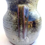 Sarthois pitcher in grey sandstone and rust effect