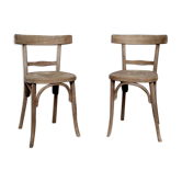 Paire de deux chaises bistrot en bois motif serpent