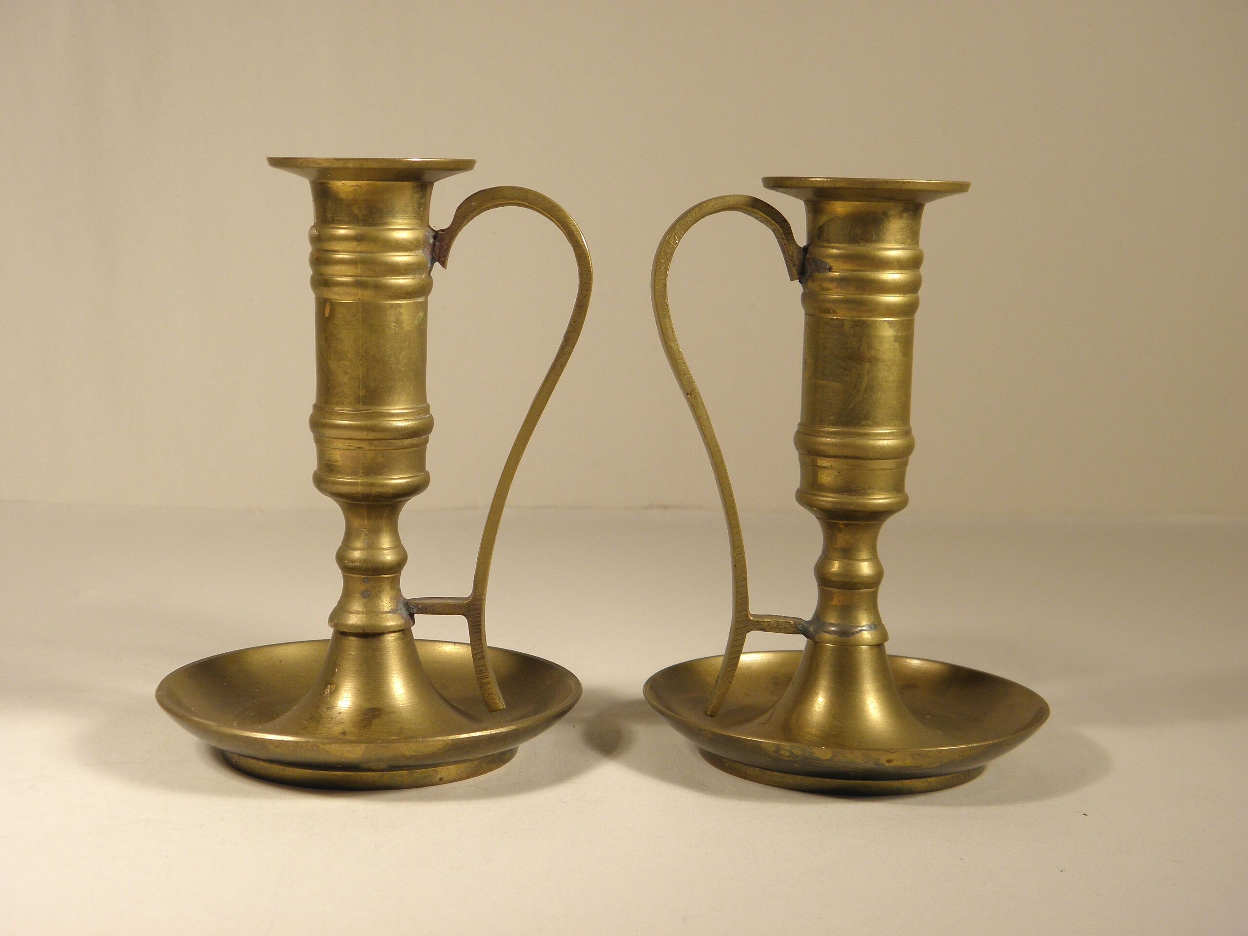 Pair of brass candle holders