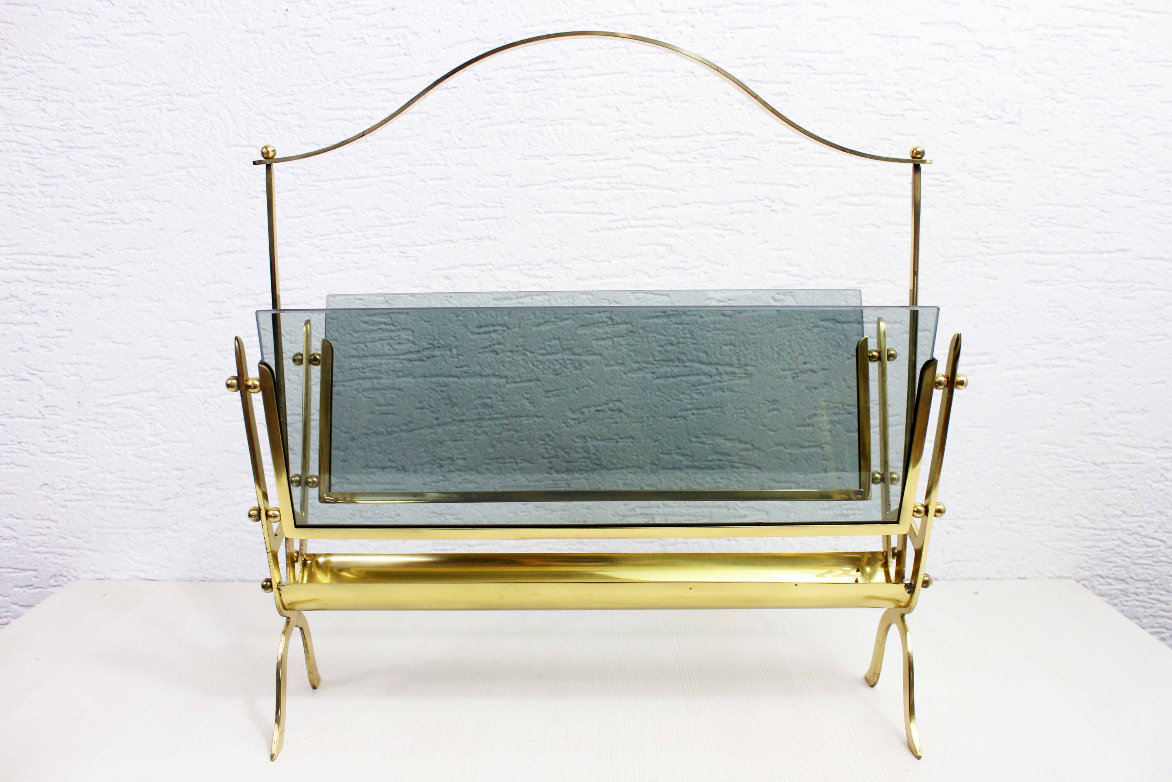 Glass and brass magazine rack, 1970