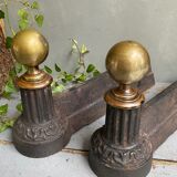 Pair of cast iron and brass chenets