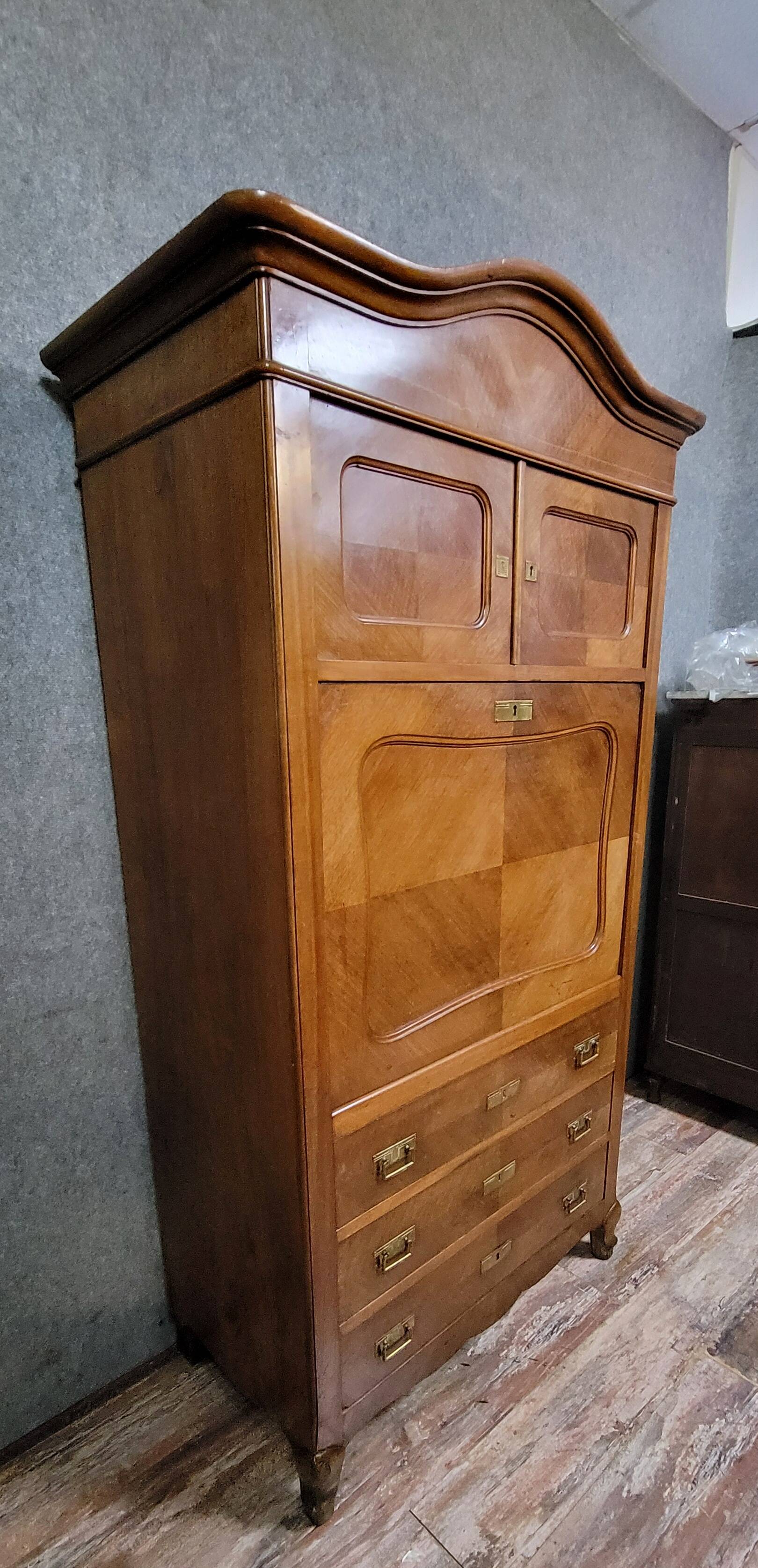Rare Biedermeier guillotine secretary, made of walnut and marquetry.