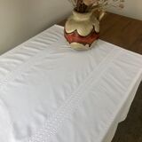 Nappe with embroidered stripes