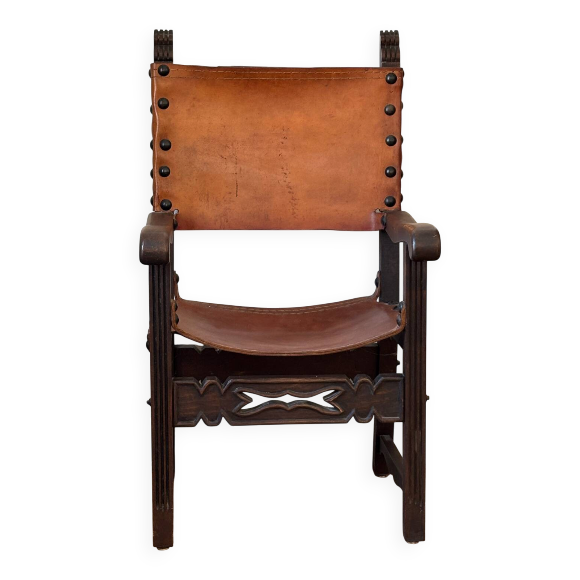 Frailero armchair, antique Spanish — carved wood & full-grain leather.