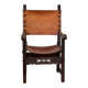 Frailero armchair, antique Spanish — carved wood & full-grain leather.