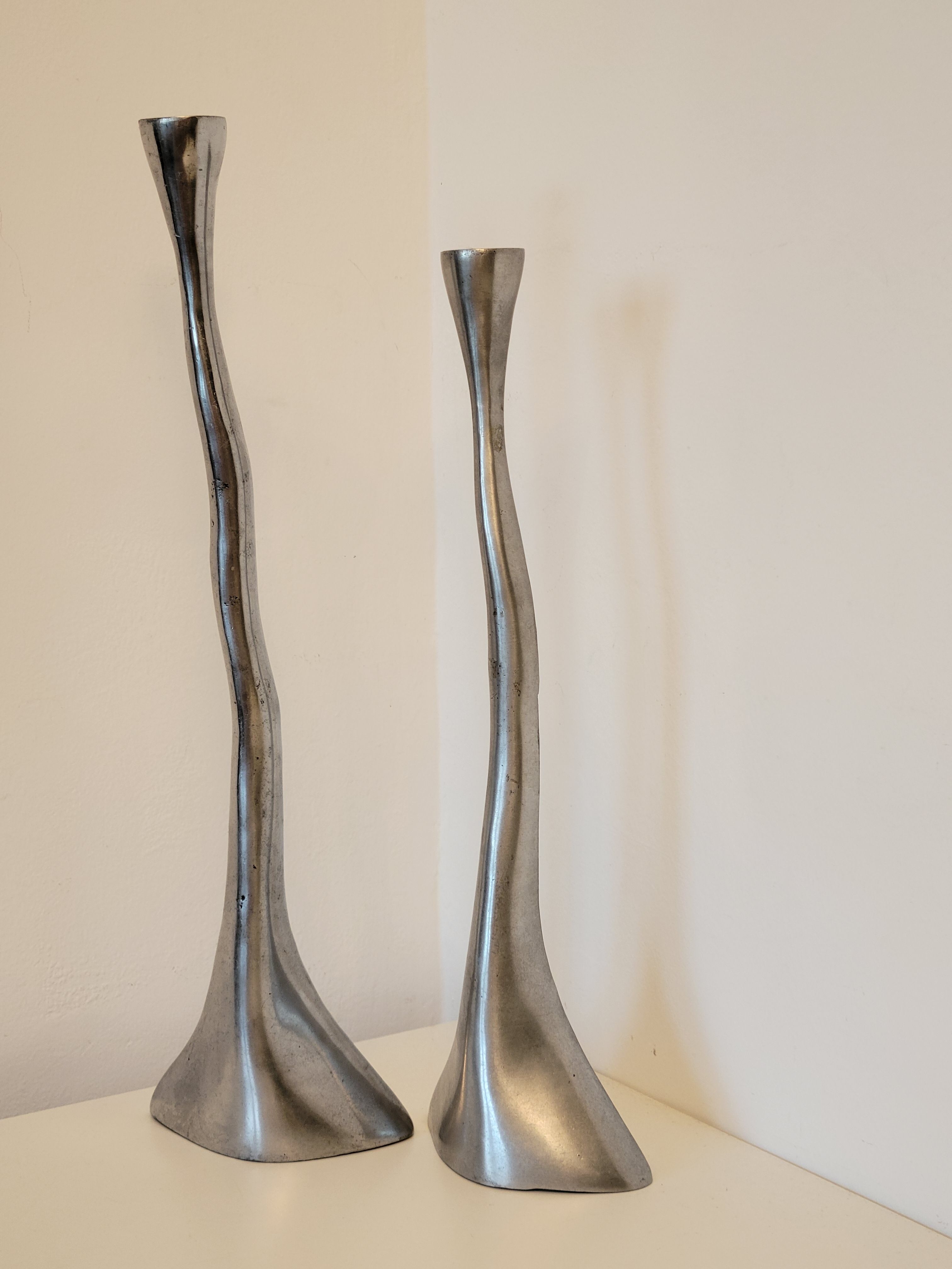 Pair of brutalist metal candlesticks in organic shape sleek design
