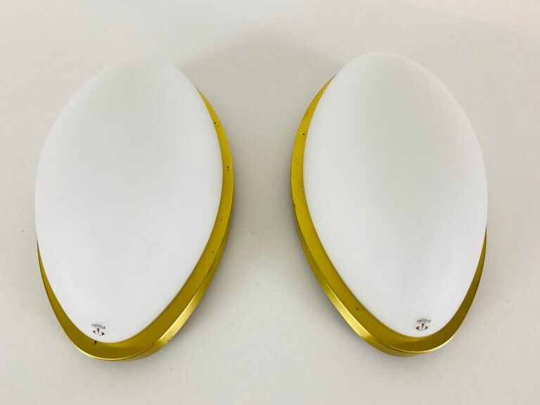 Pair of opaque glass wall lamps by Peill & Putzler, 1970, Germany