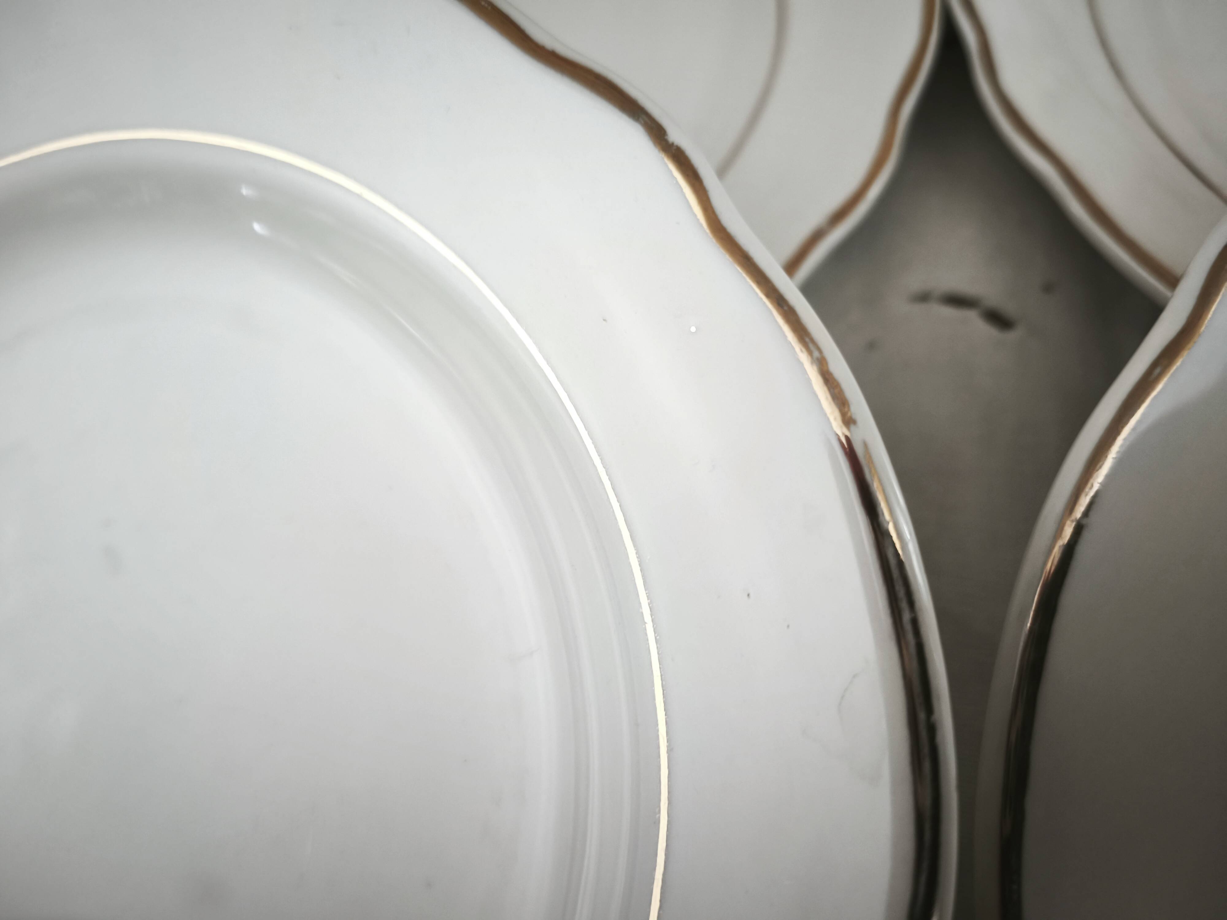 Set of 12 white earthenware dessert plates with a gold rim from Sarreguemines.