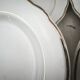 Set of 12 white earthenware dessert plates with a gold rim from Sarreguemines.
