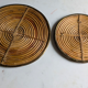 Rattan trivets attributed to Gabriella Crespi.