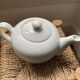 Round teapot in white earthenware, 1 liter