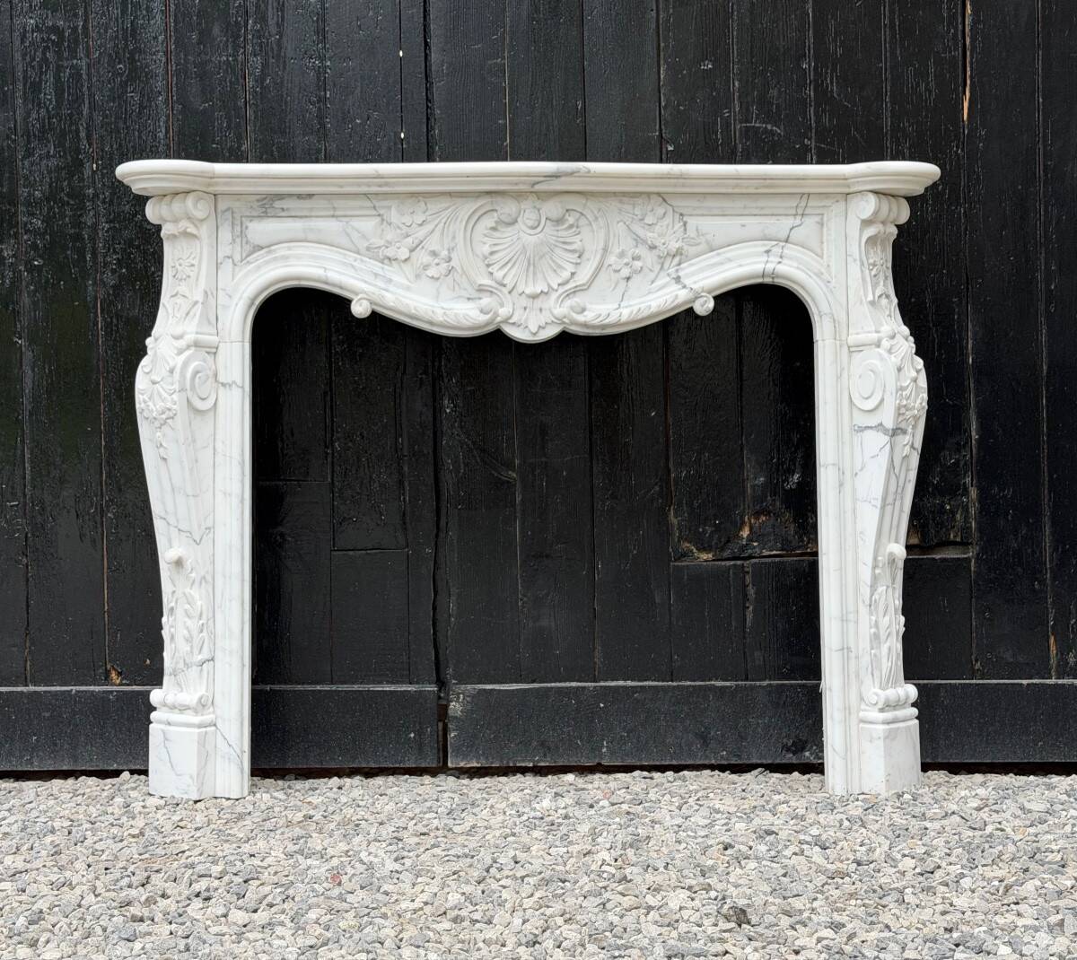 Louis XV style fireplace in Carrara marble, circa 1980.