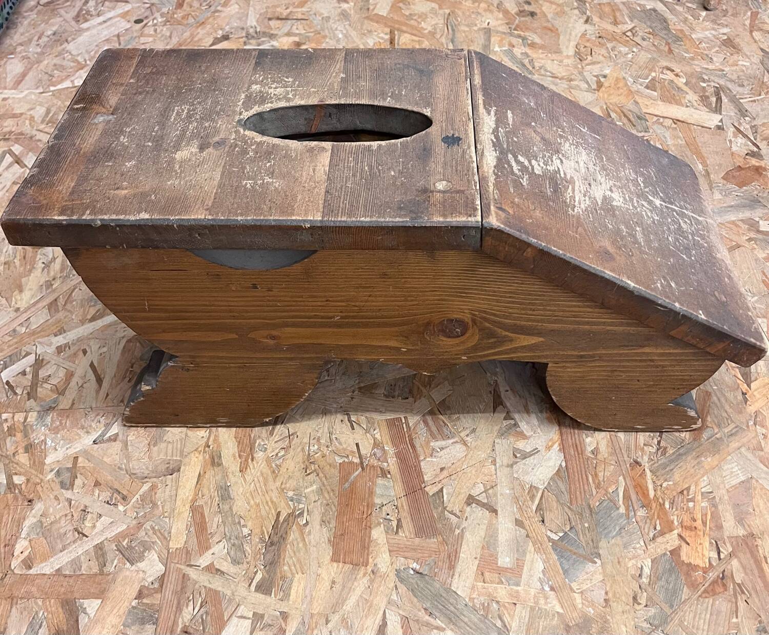 Old wooden footrest stool