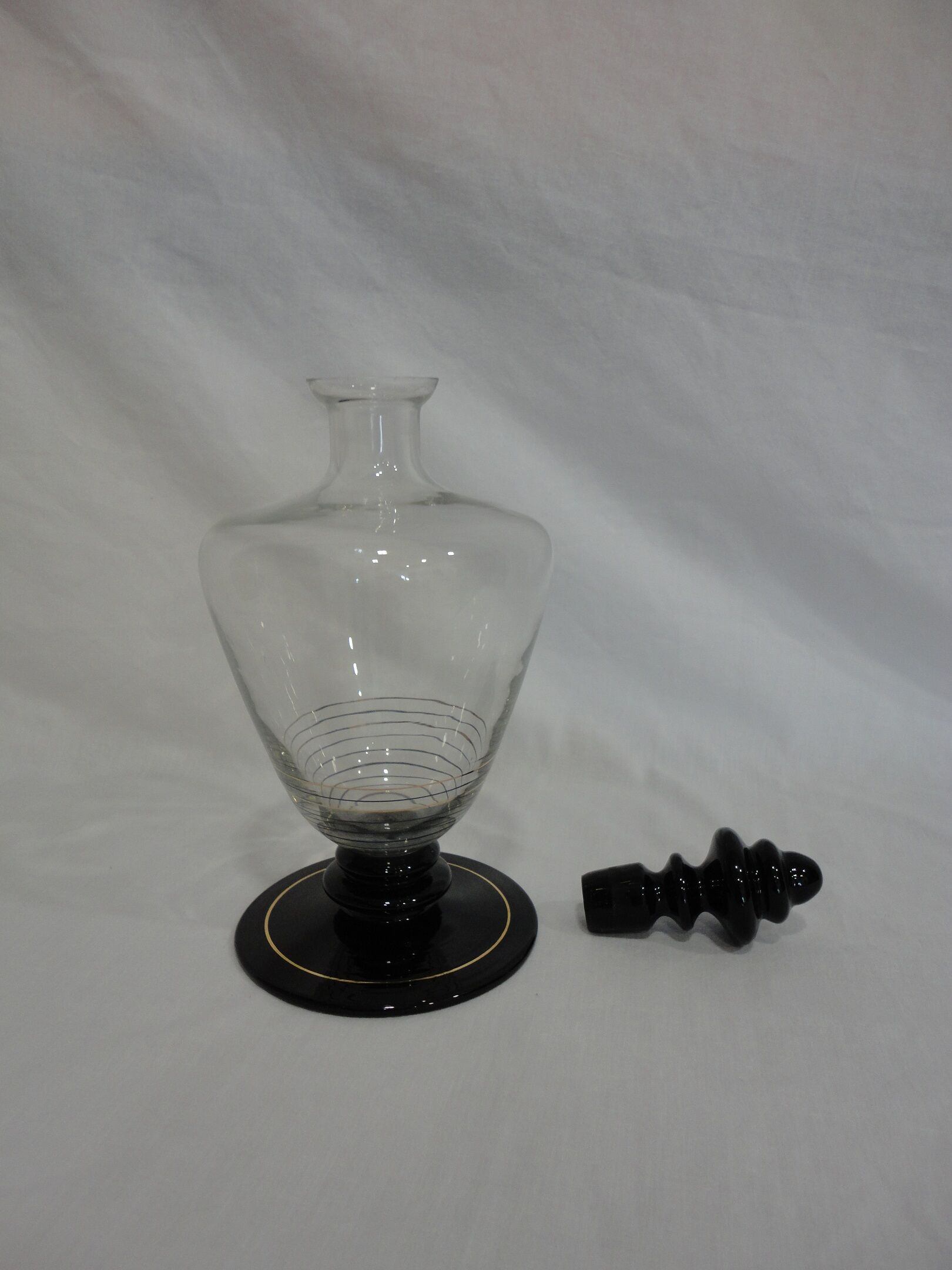 Vintage black and transparent glass carafe