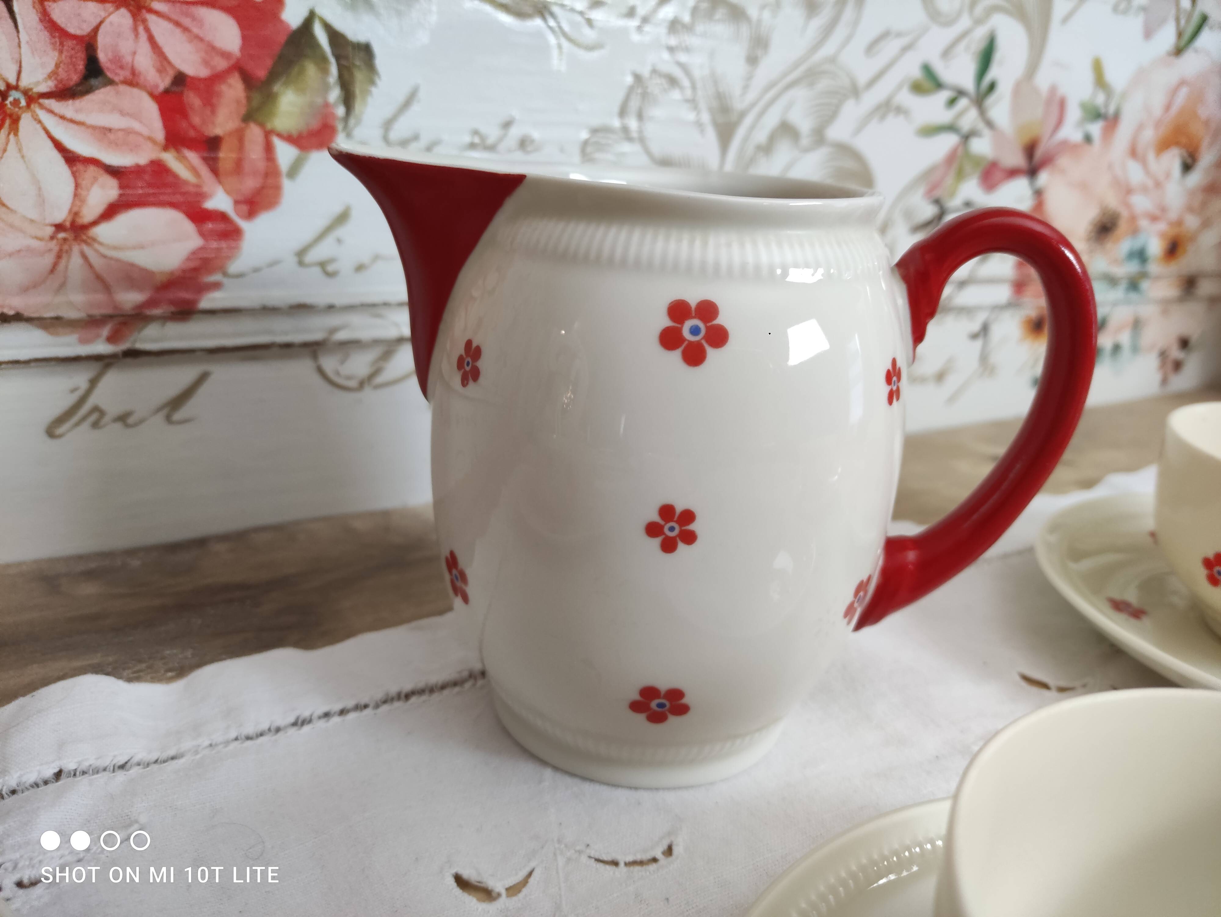 Service à café ou à thé 11 pièces en porcelaine Bavaria beige et petites fleurs oranges