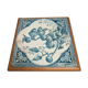 Antique trivet in Gien tile with blue bird decoration – wooden border
