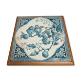 Antique trivet in Gien tile with blue bird decoration – wooden border