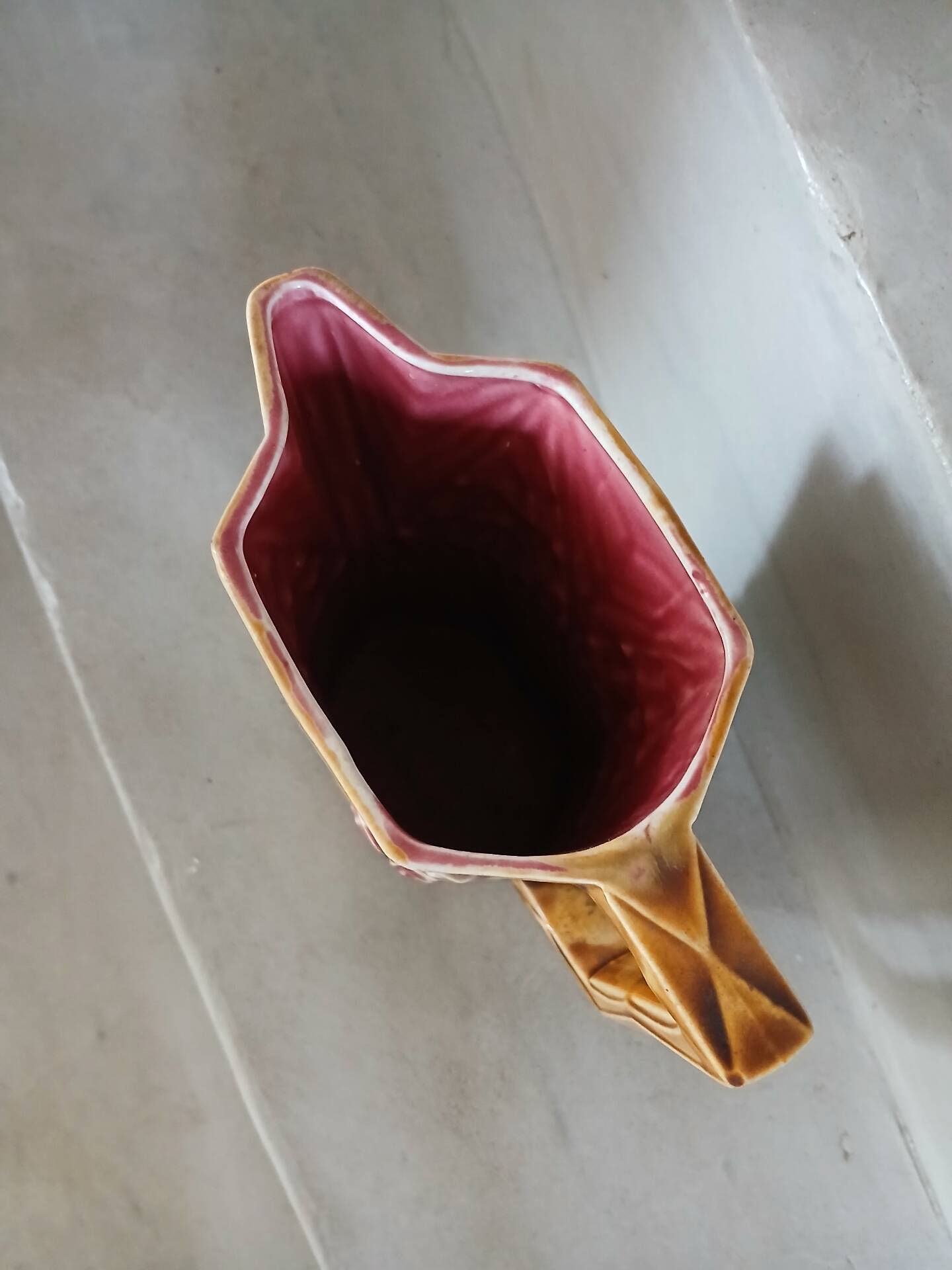 Antique pitcher in Onnaing slipware