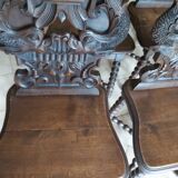 4 stylized dolphin back chairs