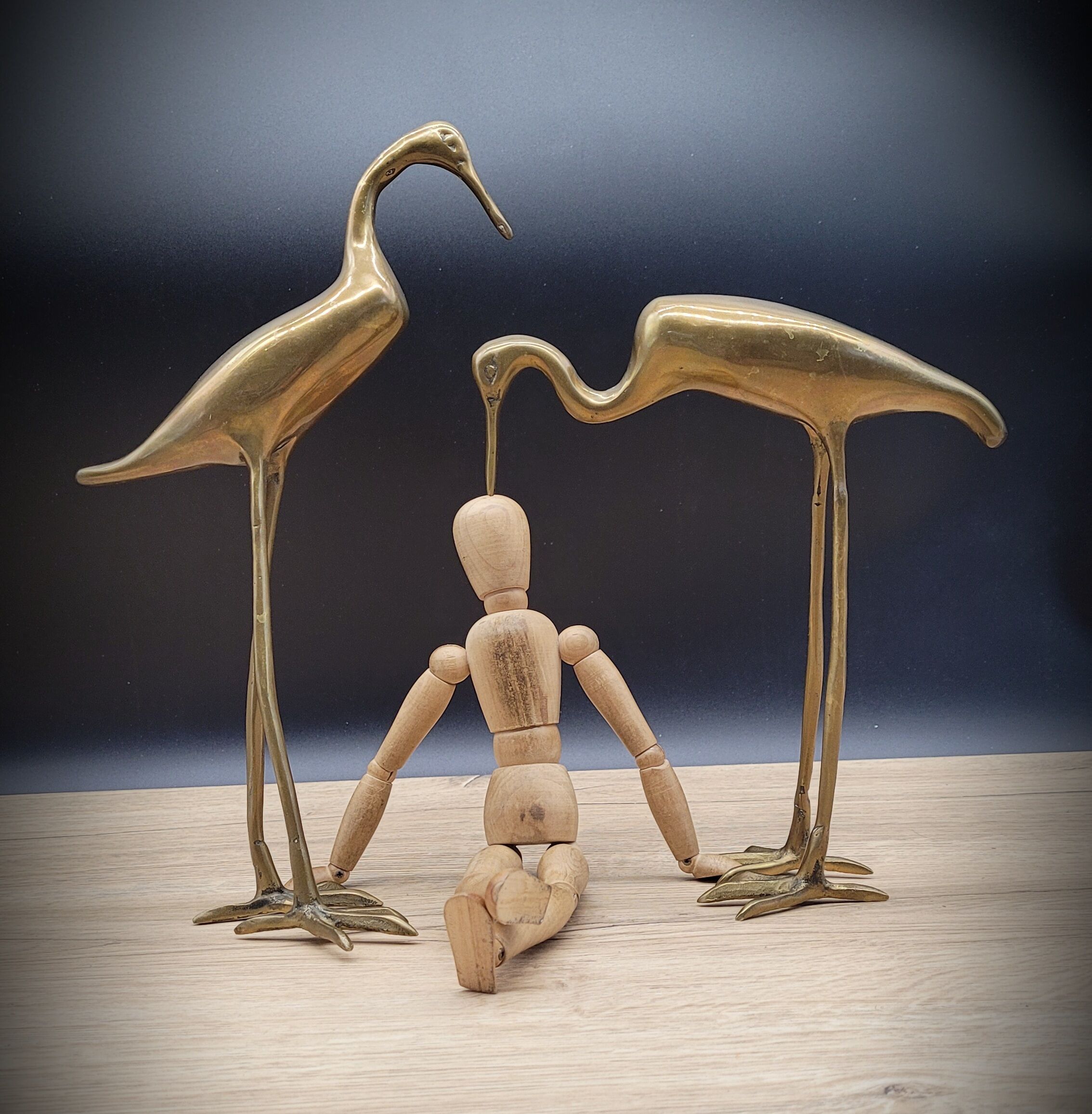 Duo brass herons
