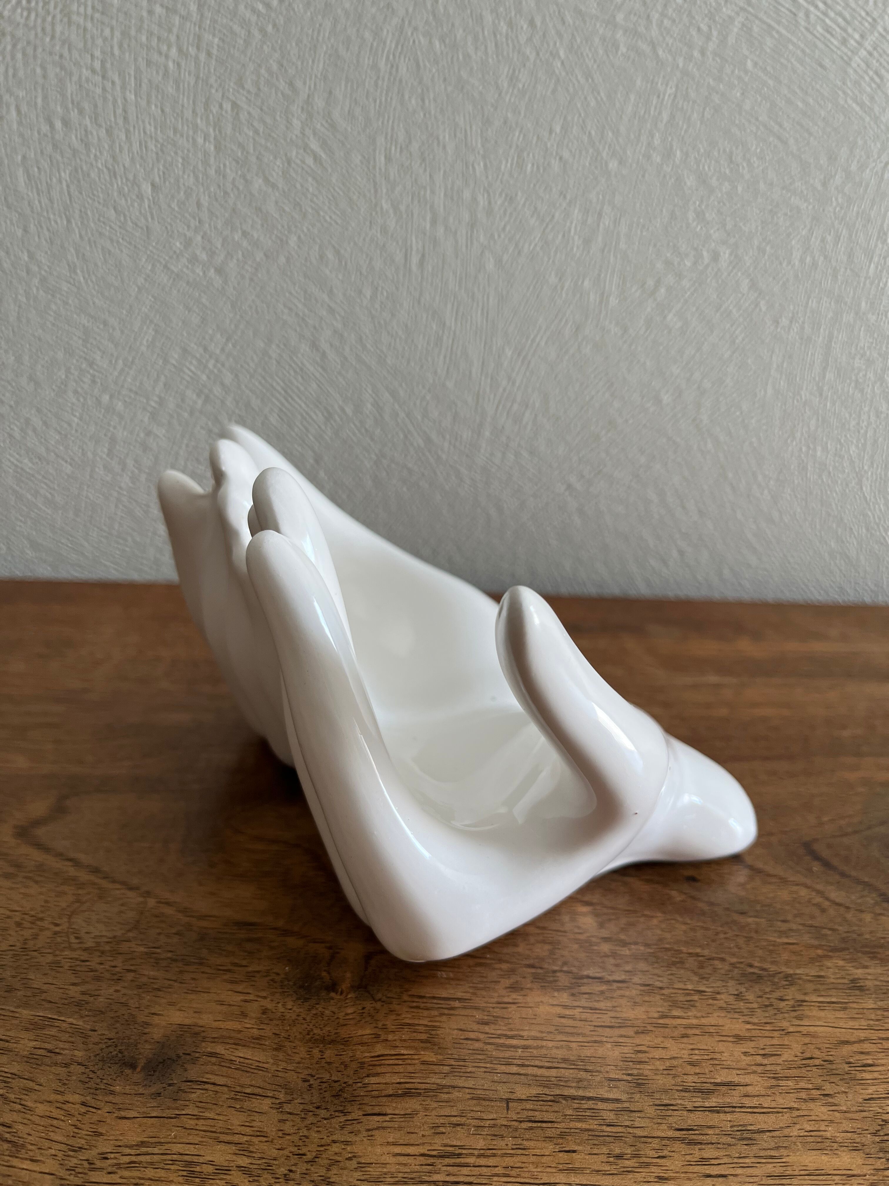 Empty white ceramic hand pocket