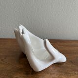 Empty white ceramic hand pocket