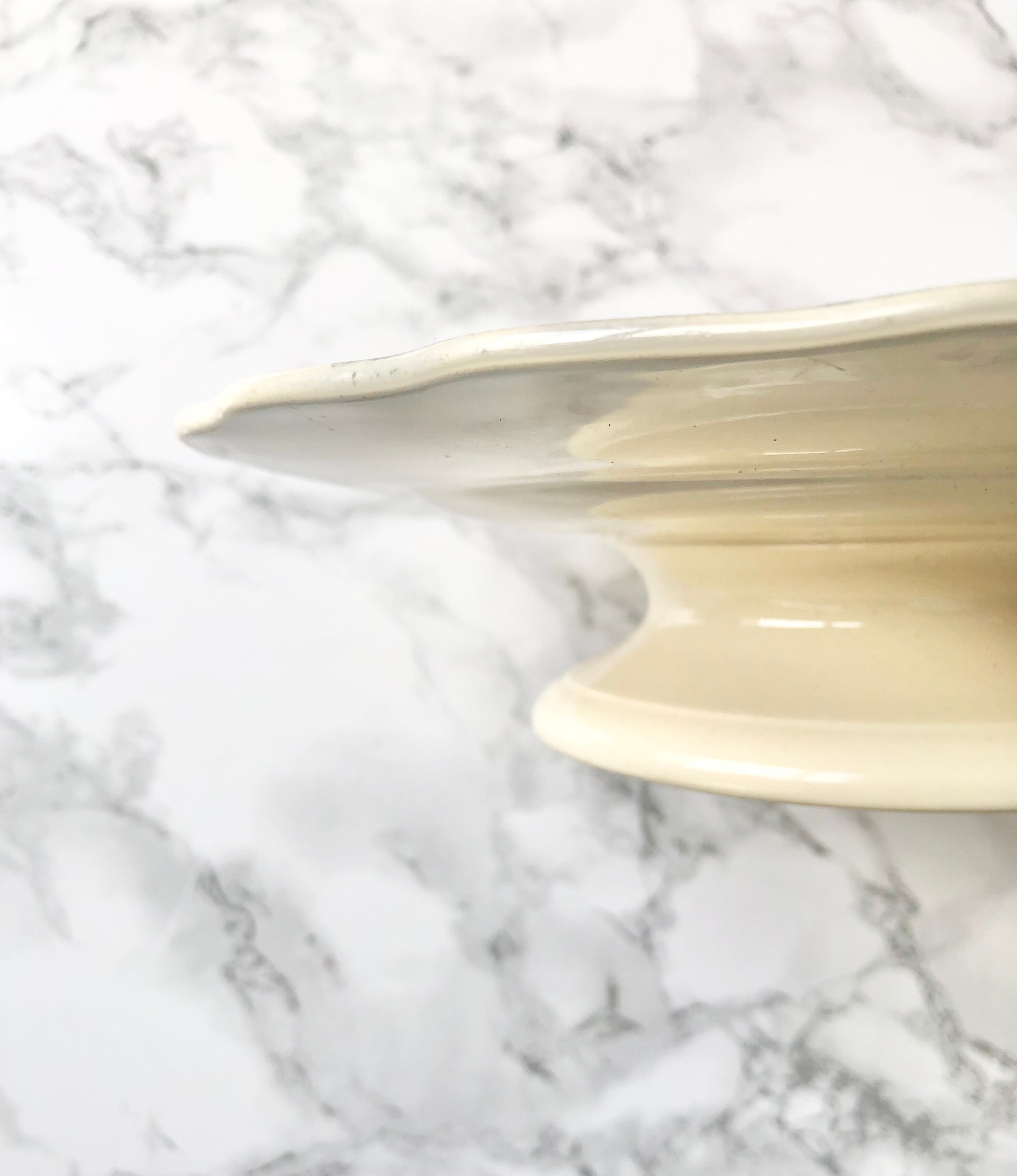 Former round cake dish on foot with blue printed decoration BWM and Co. Brown Westhead Moore - Co