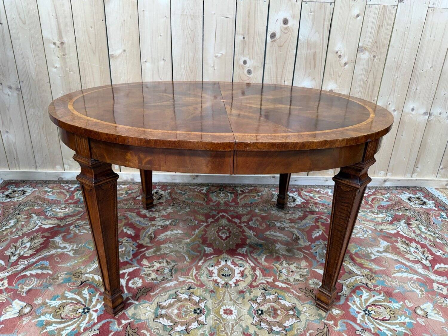 Extendable oval table in Louis XVI style – Walnut and Burl Marquetry