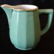 Duo of cups and saucers with his bed pitcher - 90s