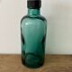 Small vintage dark turquoise blue bottle