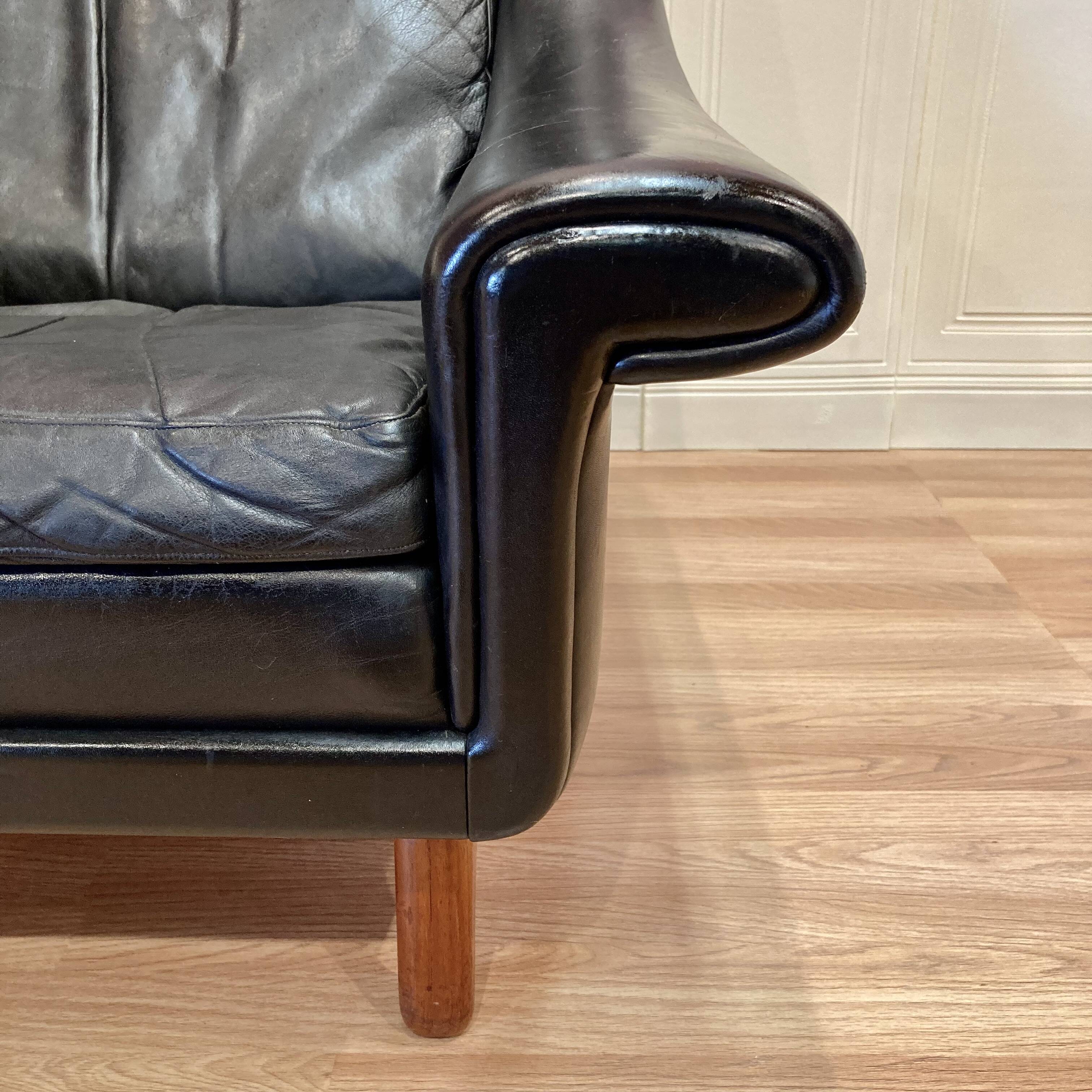 Fauteuil design scandinave Aage Christiansen cuir noir 1950.