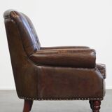 Cognac colored brown grained cowhide chesterfield armchair