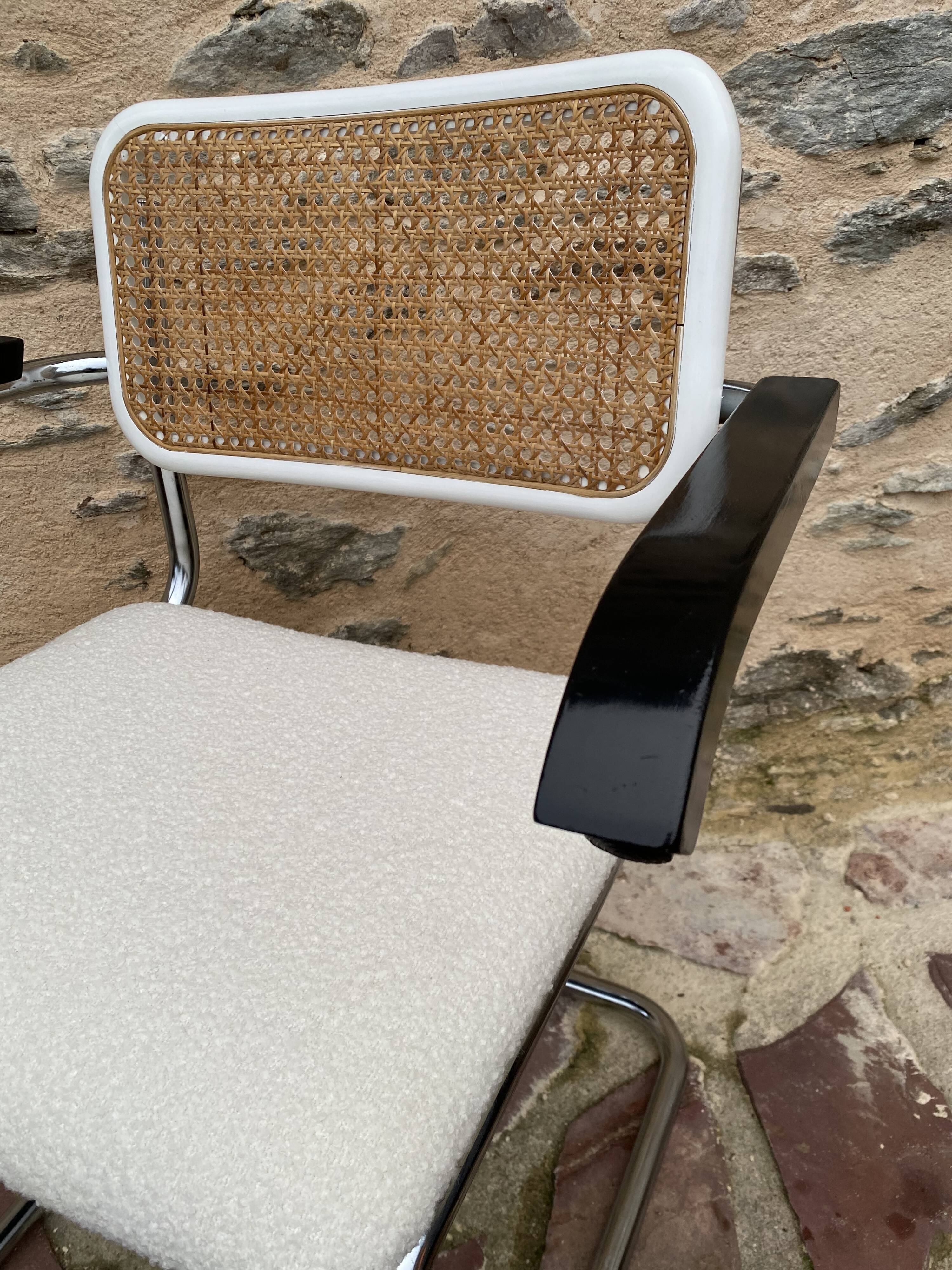 Cantilever armchair in cane and bouclette fabric