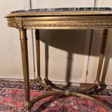 Louis XVI style pedestal table in gilded wood