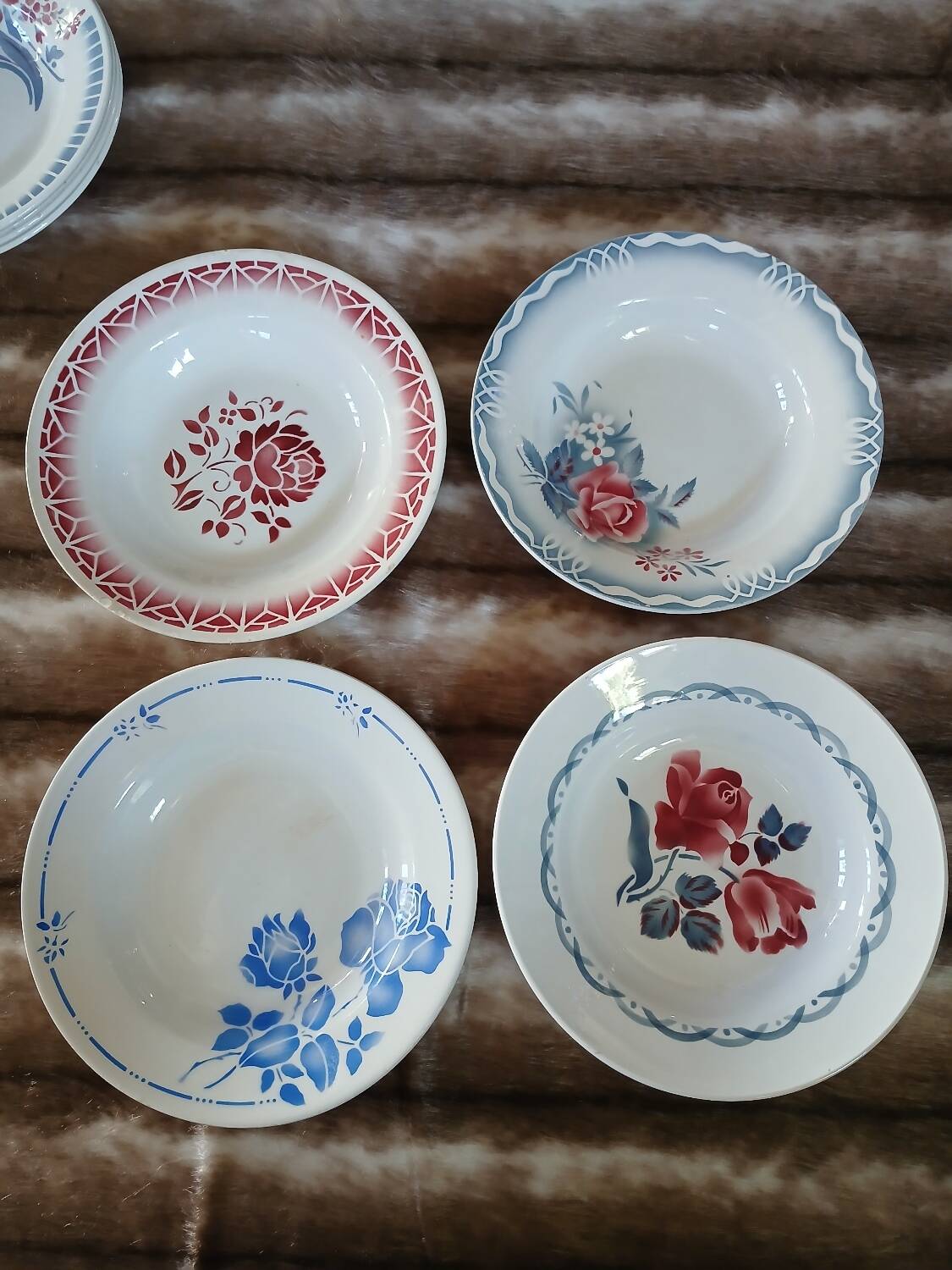 16 mismatched antique deep plates