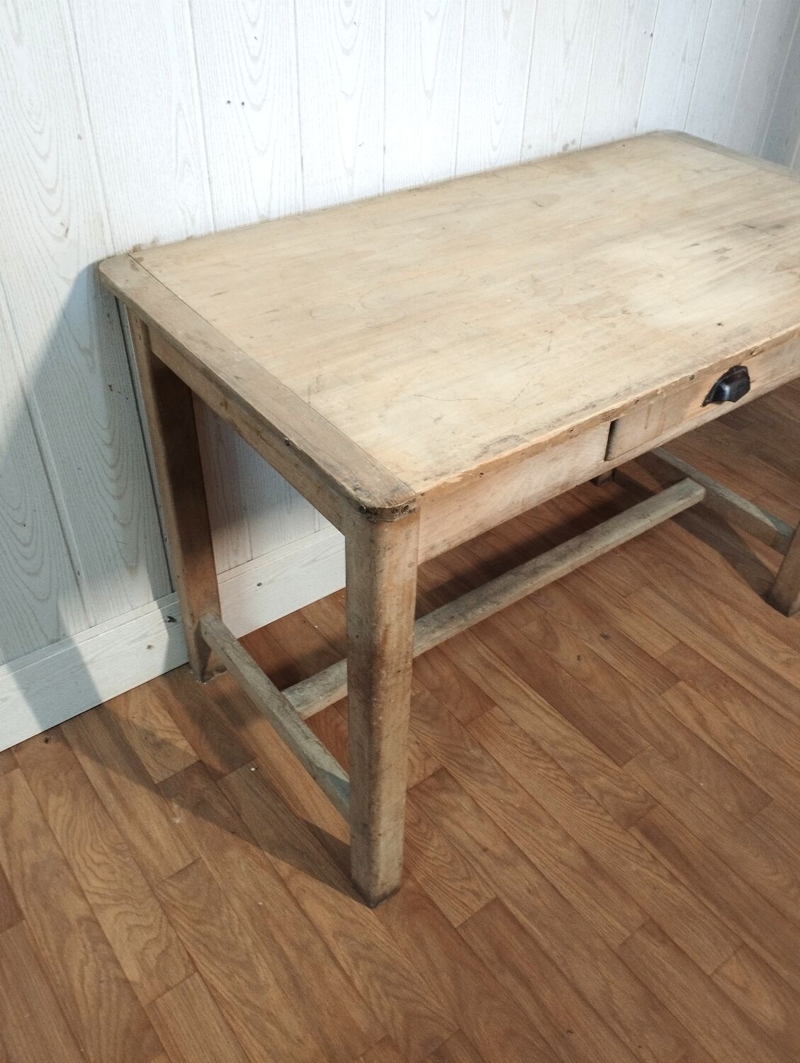 Antique farmhouse table in raw wood