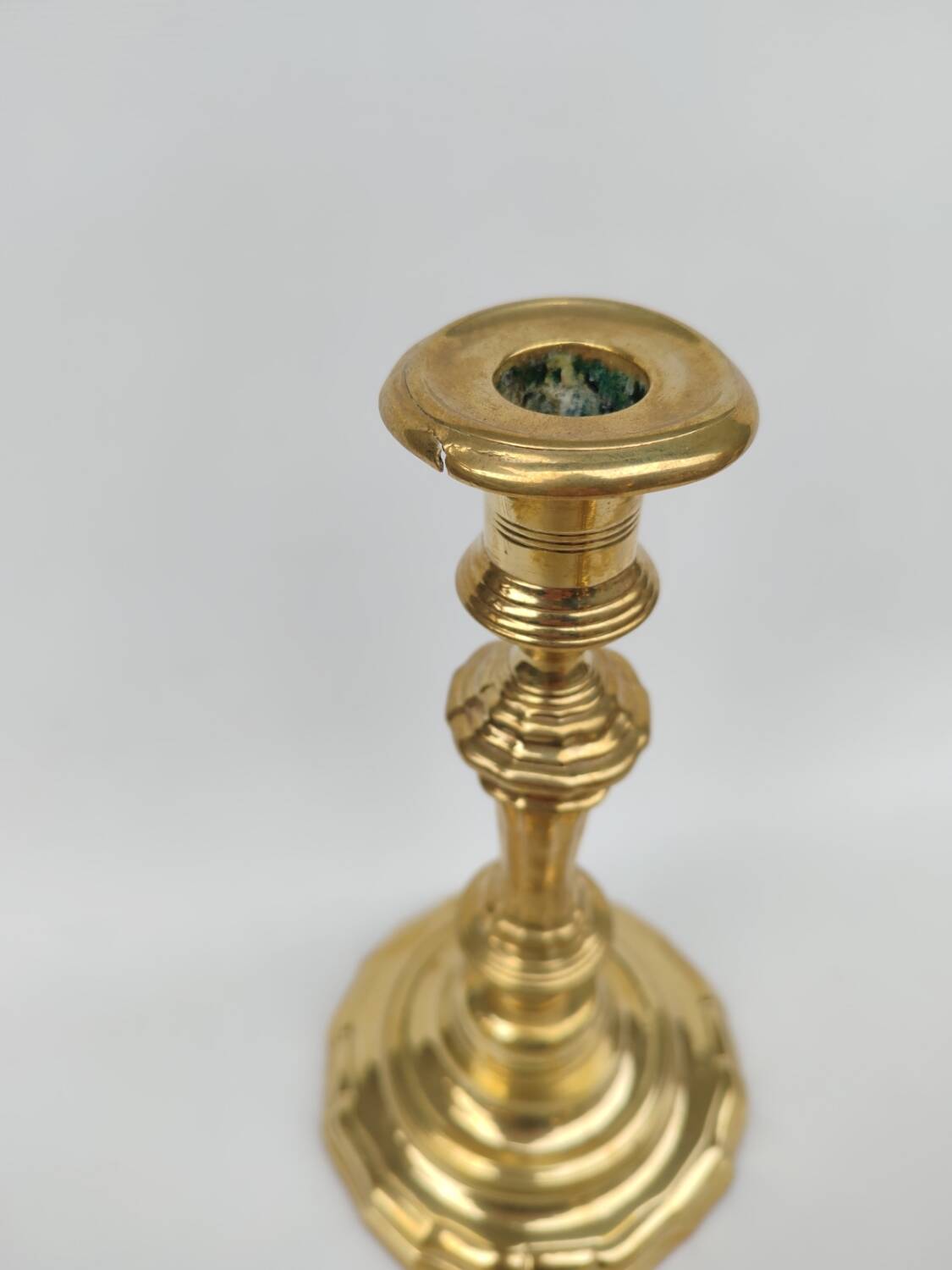 Pair of solid brass candlesticks, early 18th century.