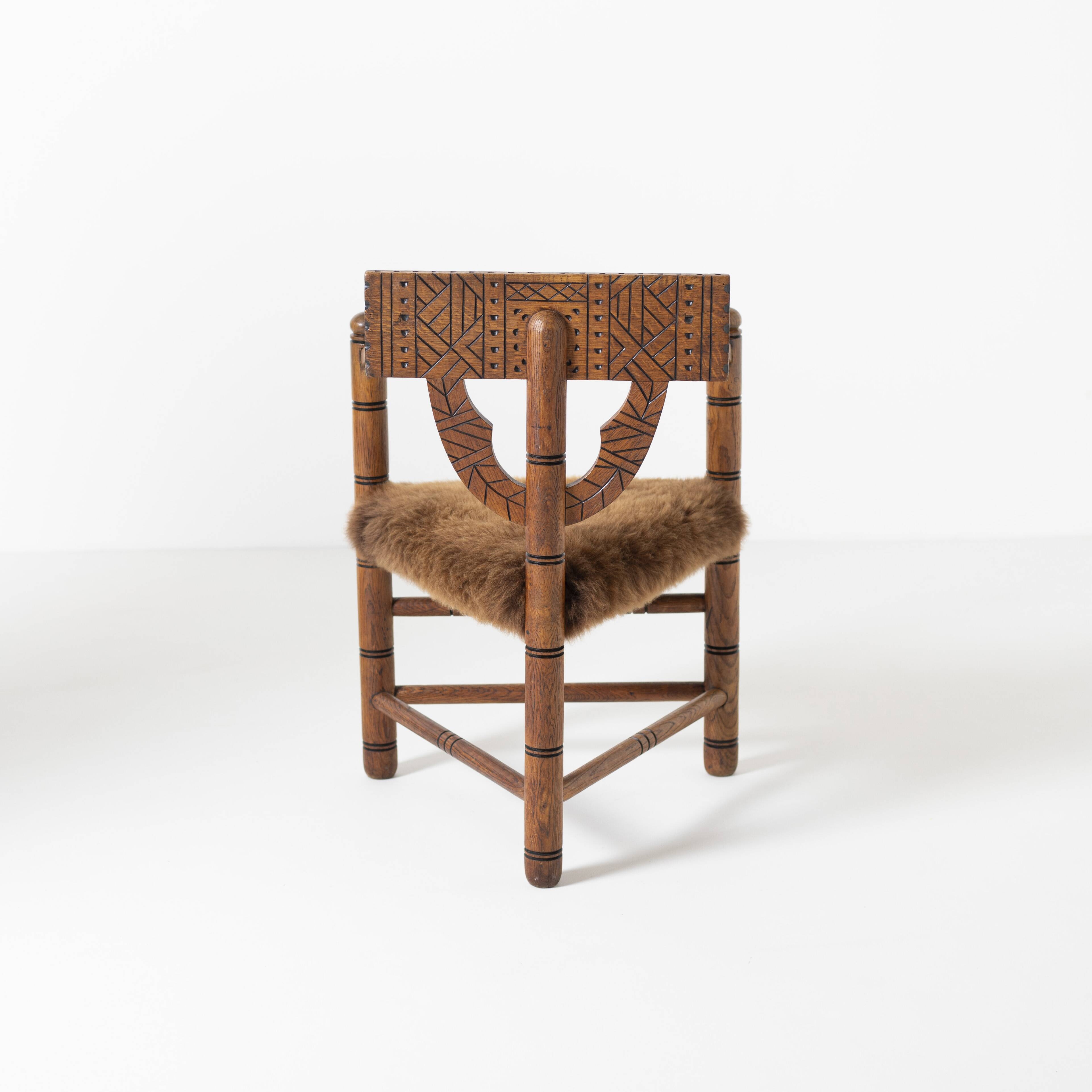 Hand carved brutalist  / folk 'Monk' chair, reupholstered in sheepskin, Swe