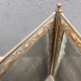 Antique fireplace screen in copper and brass from the 19th century.