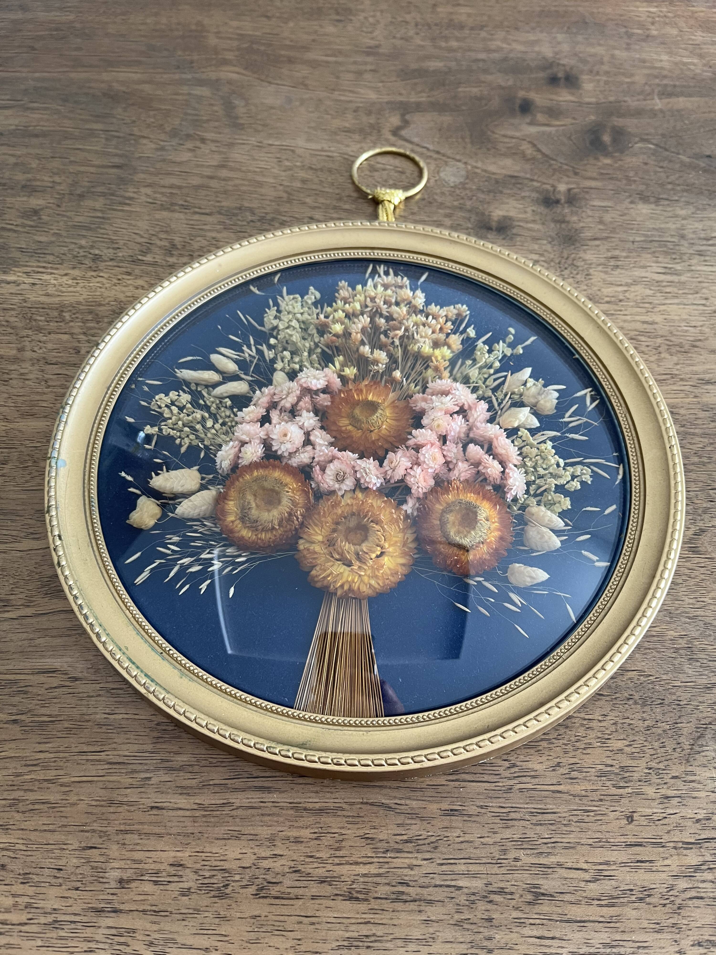 Cadre rond verre bombé fleurs séchées