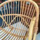 Vintage adult rattan armchair basket