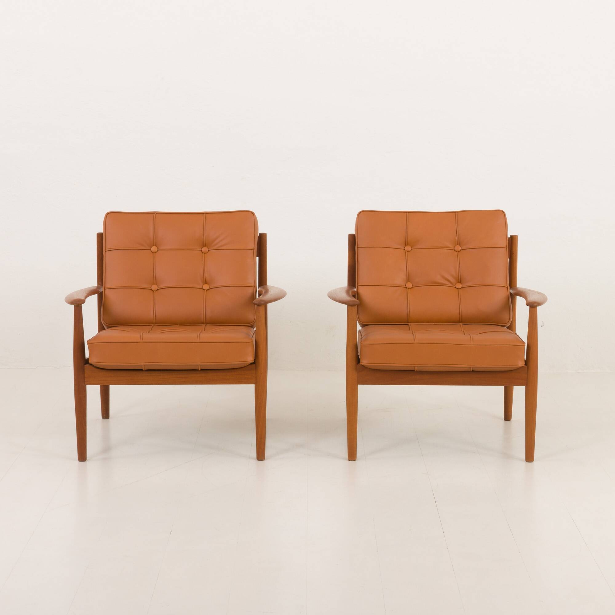 Rare Grete Jalk teak lounge chairs in aniline cognac leather for Cado