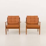 Rare Grete Jalk teak lounge chairs in aniline cognac leather for Cado
