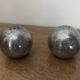 Brutalist salt and pepper ball in cast steel