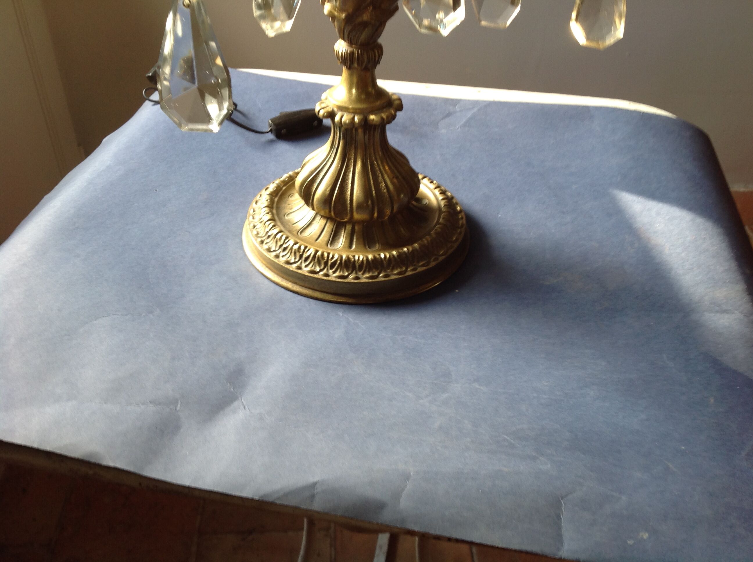 Girandolle in bronze and stamps, early 20th